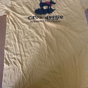 Here is a Cruz Doggie yellow medium Tee shirt brand new